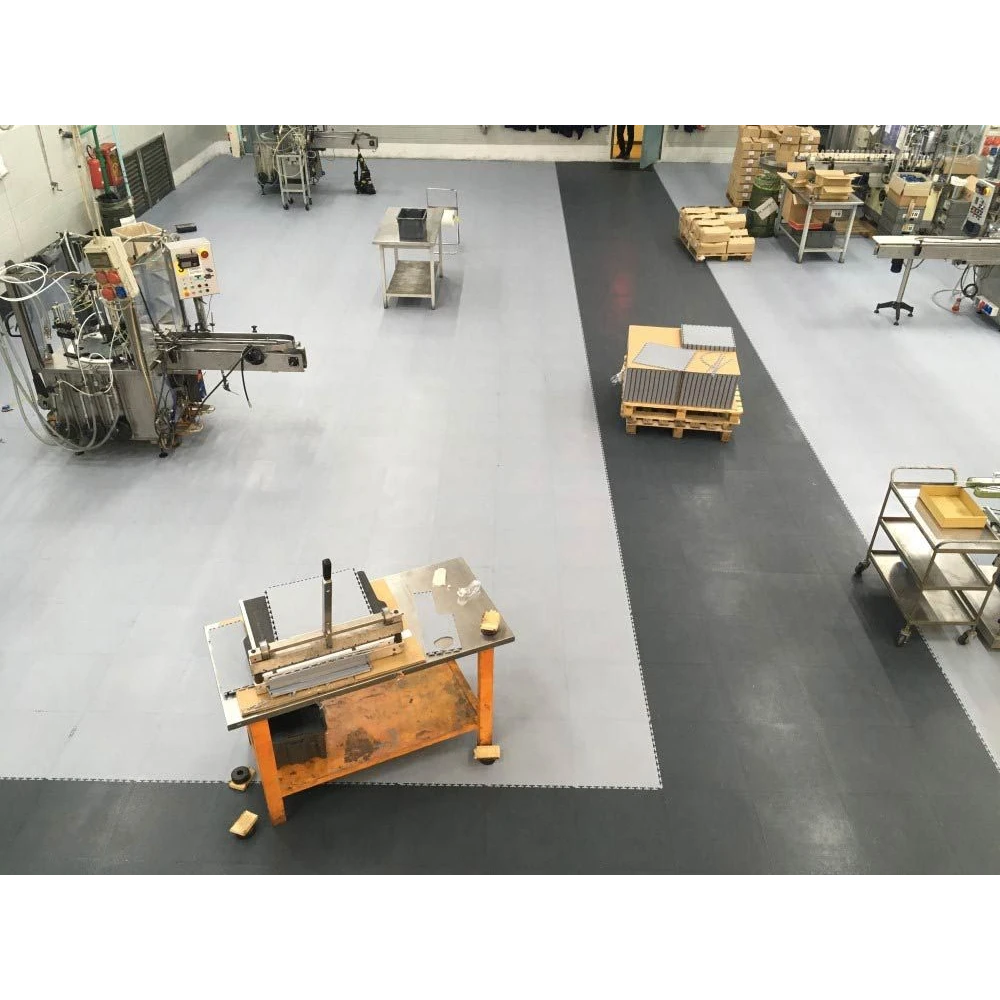 Pavimento Industriale Autoposante in PVC