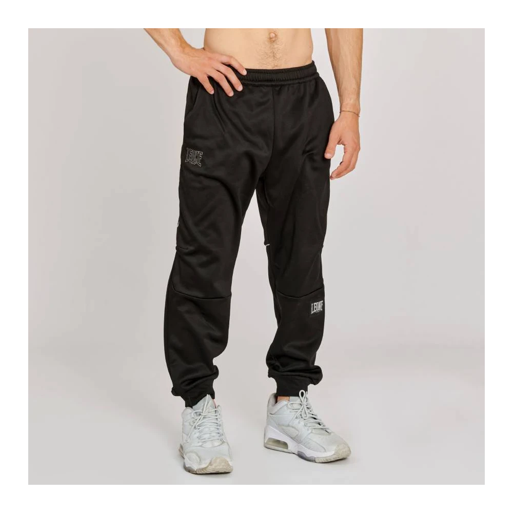 Pantaloni tuta in poliestere con tasche laterali MOD. OUTLINE Pantaloni tuta in poliestere con tasche laterali MOD. OUTLINE
