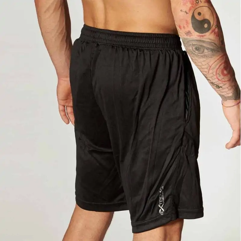 Pantaloncino versatile e multifunzionale. 100% in poliestere - Nero